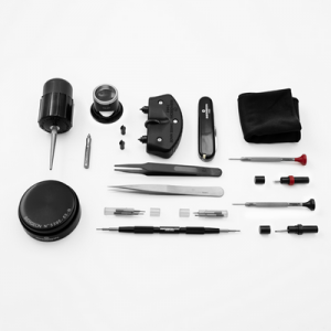 BERGEON 7814 Starter Service Kit&nbsp;

For the change of bracelets and small interventions.
Contains: 18 specialised tools and accessories.

Content:
1x Fine tool with bars N° 5767-F
1x Tweezers N° 7024-1
1x Tweezers N° 7423-2A
1x Screwdriver Ø 1.00 mm N° 30081-100
1x Screwdriver Ø 1.20 mm N° 30081-120
1x Knife and case opener N° 7403
1x Blower N° 30540
1x Key for opening screwed backs N° 7662
1x Gel casing cushion N° 5395-55-N
1x Correction tool N° 6892
2x Spare chuck for polygonal cases N° 2819-A
1x Plas